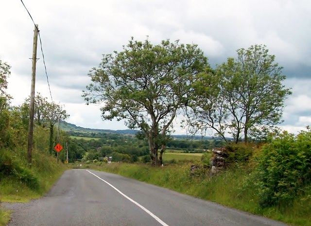 N6082 : The L3042 descending towards the Knocknaveagh Cross Roads N6082 : The L3042 descending towards the Knocknaveagh Cross Roads