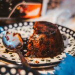 cookie on white and black ceramic saucer