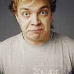 a man with a surprised look on his face