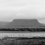 A black and white photo of a large body of water